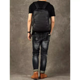 Aito musta nahka-reppu Oletusarvo Otsikko