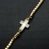 Kultainen kristillinen risti rannekoru