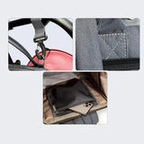 Laajennettava hoitolaukku sängyllä