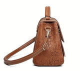 Magnolia käsilaukku