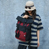 Monikäyttöinen rolltop-reppu