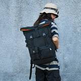 Monikäyttöinen rolltop-reppu