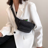 Monitaskuinen vyölaukku