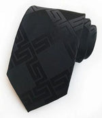 Musta kuviollinen ruudullinen solmio