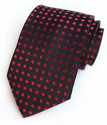 Musta solmio punaisilla pilkuilla