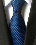 Musta solmio sinisillä pilkkuilla