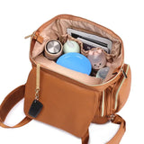 Nahkainen hoitolaukku-reppu