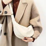 Naisten kompakti vyölaukku