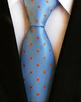 Sininen solmio oransseilla pilkuilla