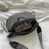 Taiteellinen vyölaukku naisille