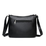 Violetta käsilaukku