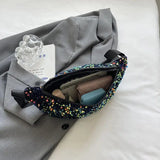 Vyölaukku kiiltävillä paljeteilla